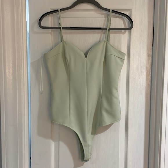 Mint green bodysuit. Size: S - Picture 1 of 4